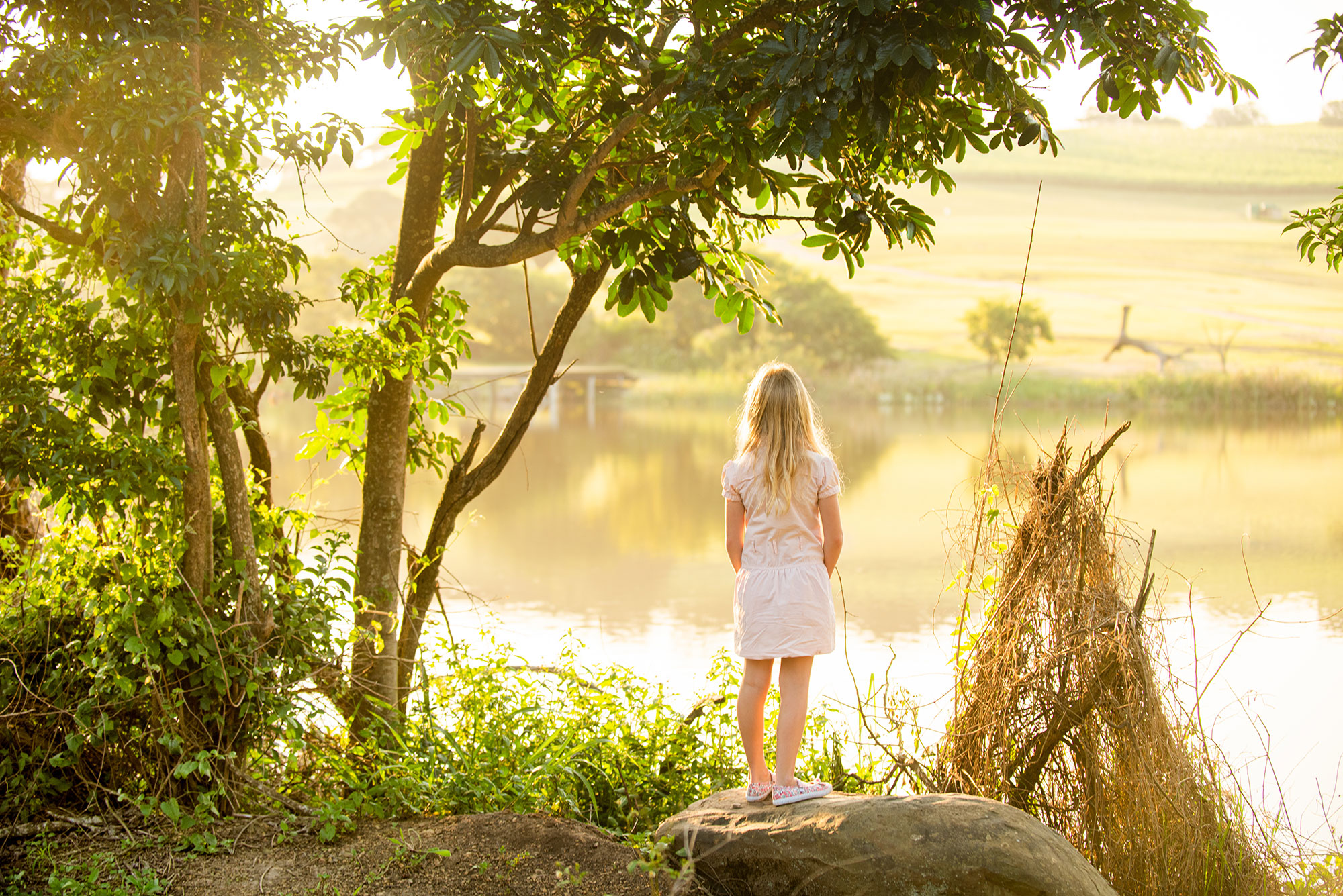 Girl Standing by Water
